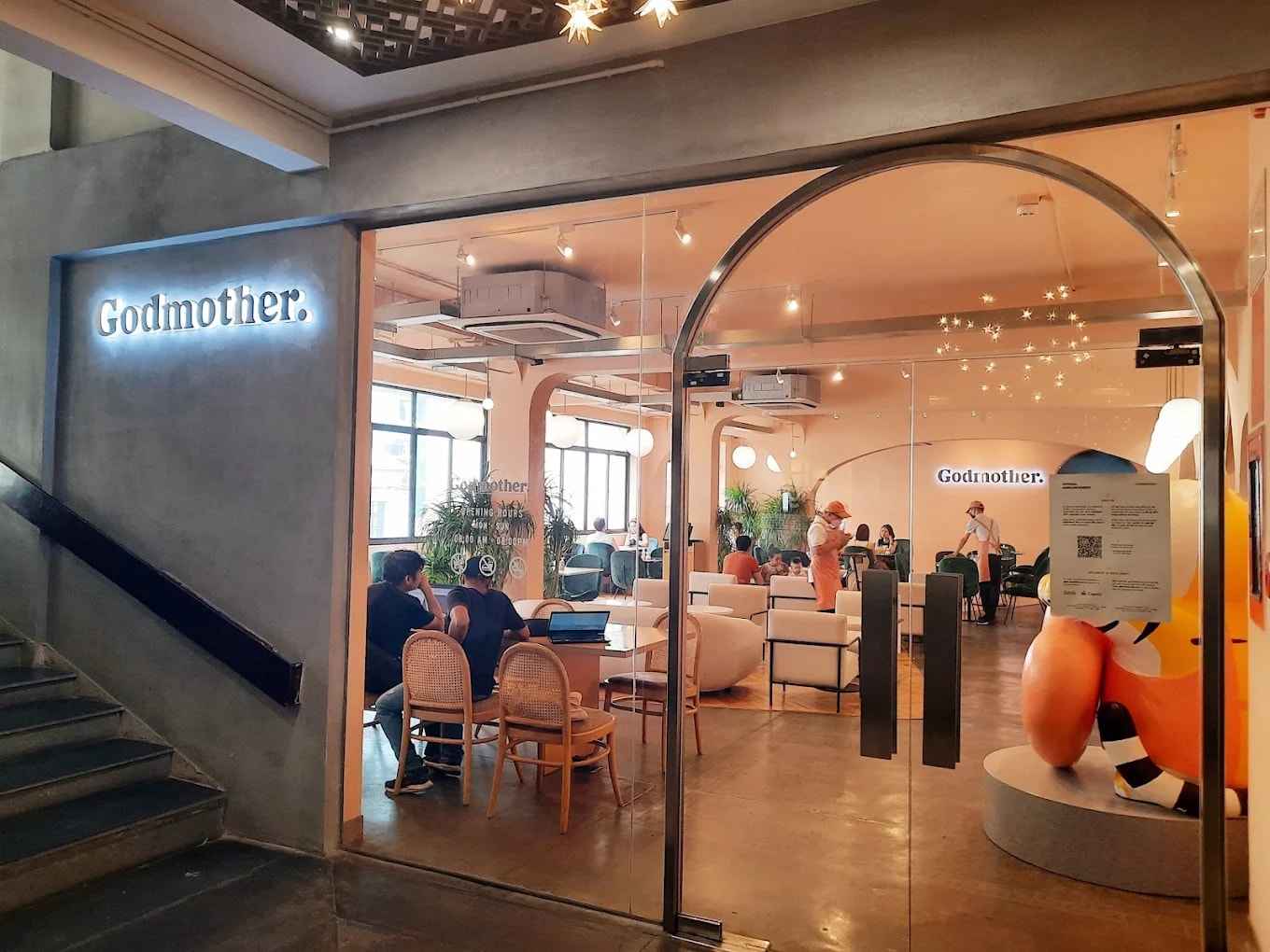 Godmother offers a spacious setting with multiple seating areasv